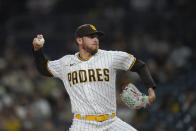San Diego Padres starting pitcher Joe Musgrove works against a San Francisco Giants batter during the first inning of a baseball game Monday, Oct. 3, 2022, in San Diego. (AP Photo/Gregory Bull)