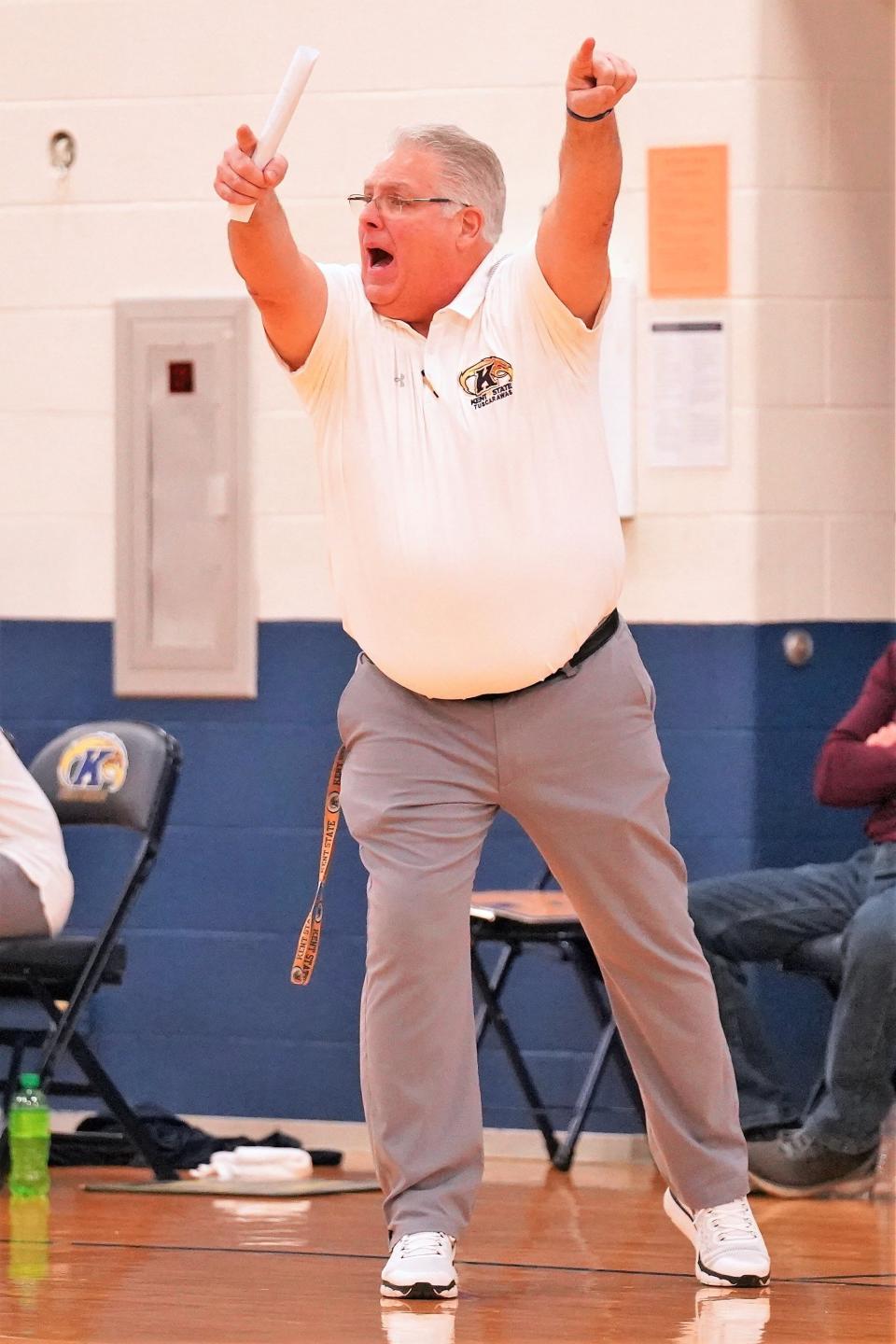 Coach Tharp directs traffic against Miami Hamilton.