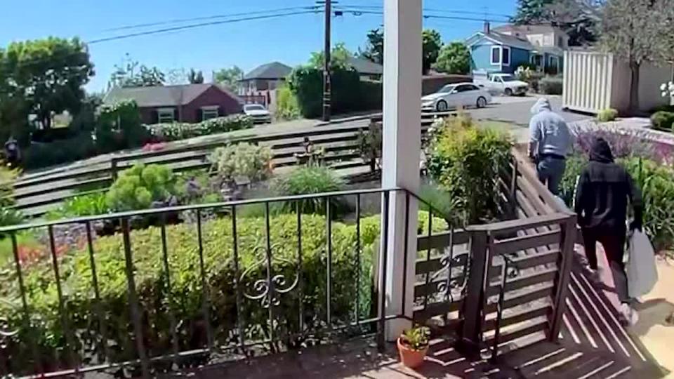 <div>Surveillance video shows two men running out of Oaklands Reinhardt Drive home with a pillowcase stuffed with jewelry.</div>