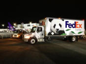 FedEx Panda Express truck awaiting the arrival of the giant pandas at the Toronto FedEx ramp. <a class="link " href="http://t.co/RnsQU5O5dp" rel="nofollow noopener" target="_blank" data-ylk="slk:pic.twitter.com/RnsQU5O5dp;elm:context_link;itc:0;sec:content-canvas">pic.twitter.com/RnsQU5O5dp</a>