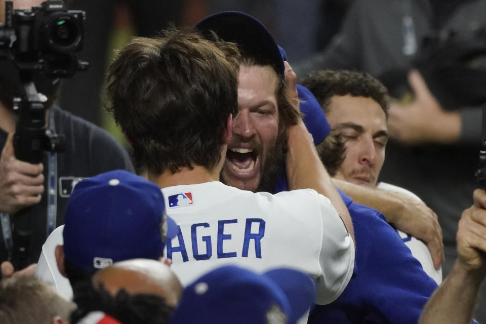 Los Angeles Dodgers pitcher Clayton Kershaw celebrates they defeat the Tampa Bay Rays 3-1 to win the baseball World Series in Game 6 Tuesday, Oct. 27, 2020, in Arlington, Texas. (AP Photo/Tony Gutierrez)