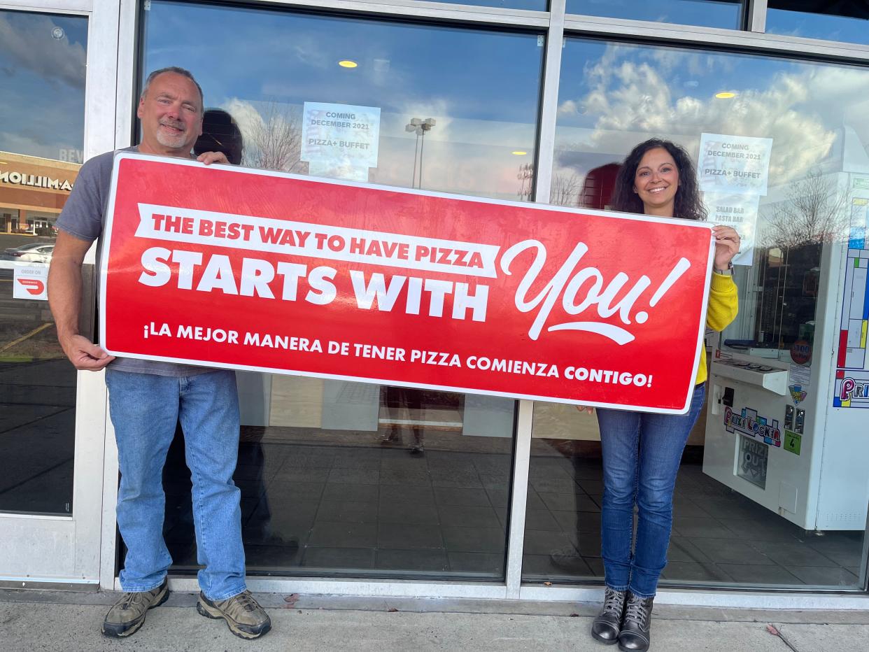 Joe and Carrie Scarborough are seen prior to opening Pizza + Buffet in this 2021 file photo.