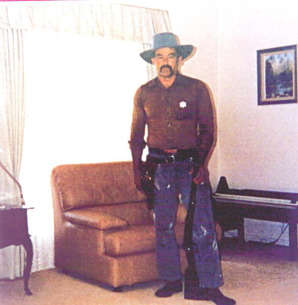 A supplied undated image shows backpacker murderer Ivan Milat posing with a gun.