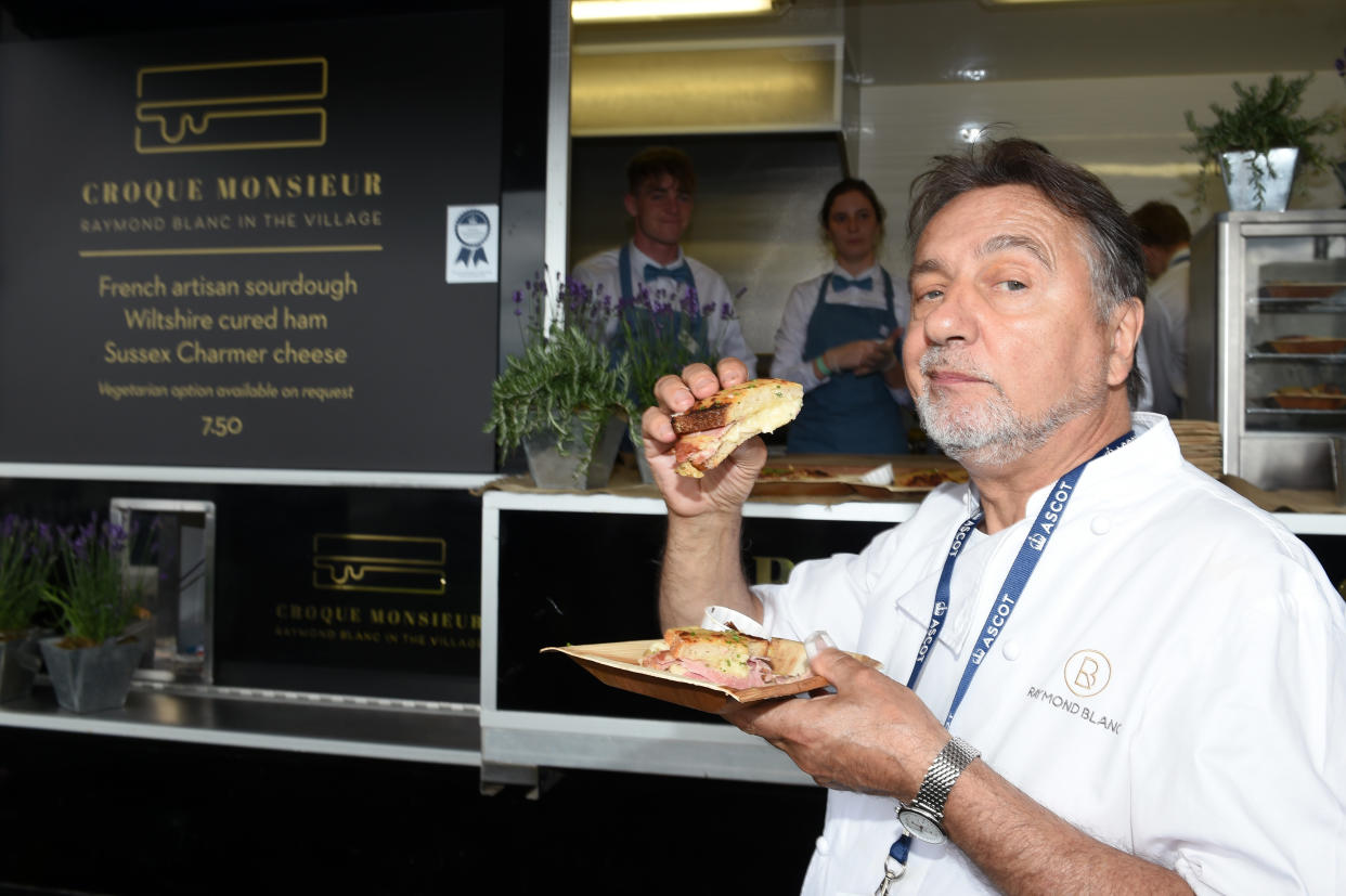 ASCOT, ENGLAND - JUNE 20:  Raymond Blanc with a croque monsieur he prepared in the Village Enclosure on day 3 of Royal Ascot at Ascot Racecourse on June 20, 2019 in Ascot, England. (Photo by Stuart C. Wilson/Getty Images for Ascot Racecourse )