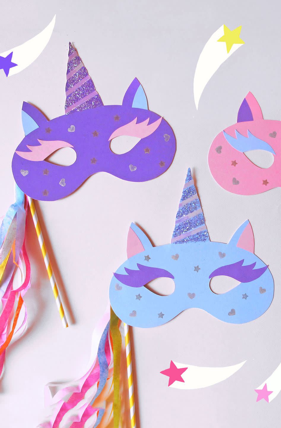 <p>These glittery unicorn masks are so easy to assemble. No magic necessary!</p><p><strong>Get the tutorial at <a href="https://go.redirectingat.com?id=74968X1596630&url=https%3A%2F%2Fwww.paperchase.com%2Fthe-journal%2Fhow-to-make-a-unicorn-mask%2F&sref=https%3A%2F%2Fwww.countryliving.com%2Fdiy-crafts%2Fg3480%2Fdiy-halloween-masks%2F" rel="nofollow noopener" target="_blank" data-ylk="slk:Paperchase;elm:context_link;itc:0;sec:content-canvas" class="link ">Paperchase</a>.</strong></p><p><a class="link " href="https://www.amazon.com/Card-Stock-Colorful-Assortment-101199/dp/B0006HXSU6/?tag=syn-yahoo-20&ascsubtag=%5Bartid%7C10050.g.3480%5Bsrc%7Cyahoo-us" rel="nofollow noopener" target="_blank" data-ylk="slk:SHOP CARD STOCK PAPER;elm:context_link;itc:0;sec:content-canvas">SHOP CARD STOCK PAPER</a> </p>