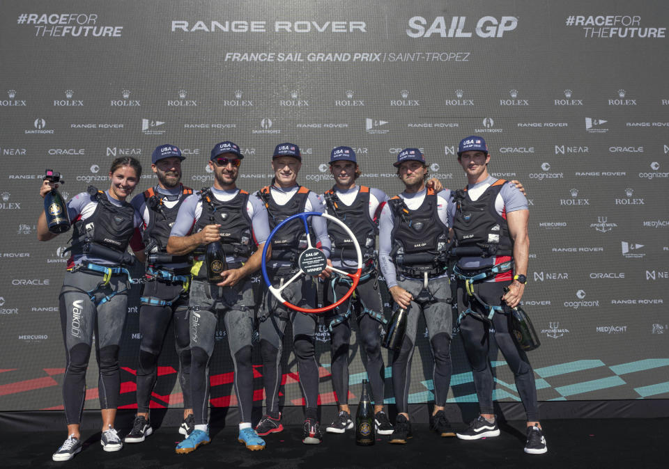 Jimmy Spithill, CEO & driver of USA SailGP Team, and his crew, celebrate winning the Range Rover France Sail Grand Prix in Saint Tropez, France, Sunday, Sept. 11, 2022. (Jon Buckle/SailGP via AP)