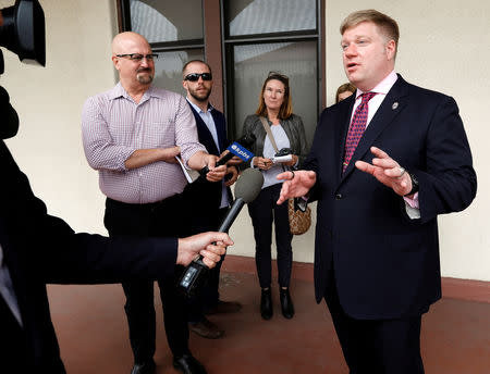 FILE PHOTO: Defense attorney Timothy Parlatore, representing US Navy SEAL Special Operations Chief Edward Gallagher, speaks with reporters at a pre-trial hearing for Gallagher's court martial for alleged war crimes in Iraq, in San Diego, California, May 22, 2019. REUTERS/Earnie Grafton/File Photo/File Photo