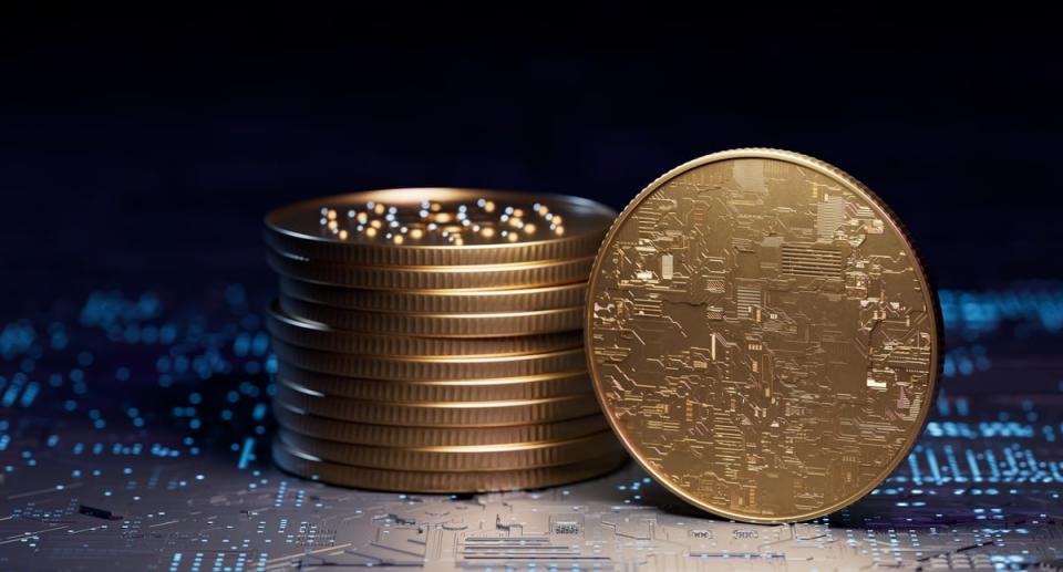 A graphic of a stack of coins with circuits printed on them representing cryptocurrency.