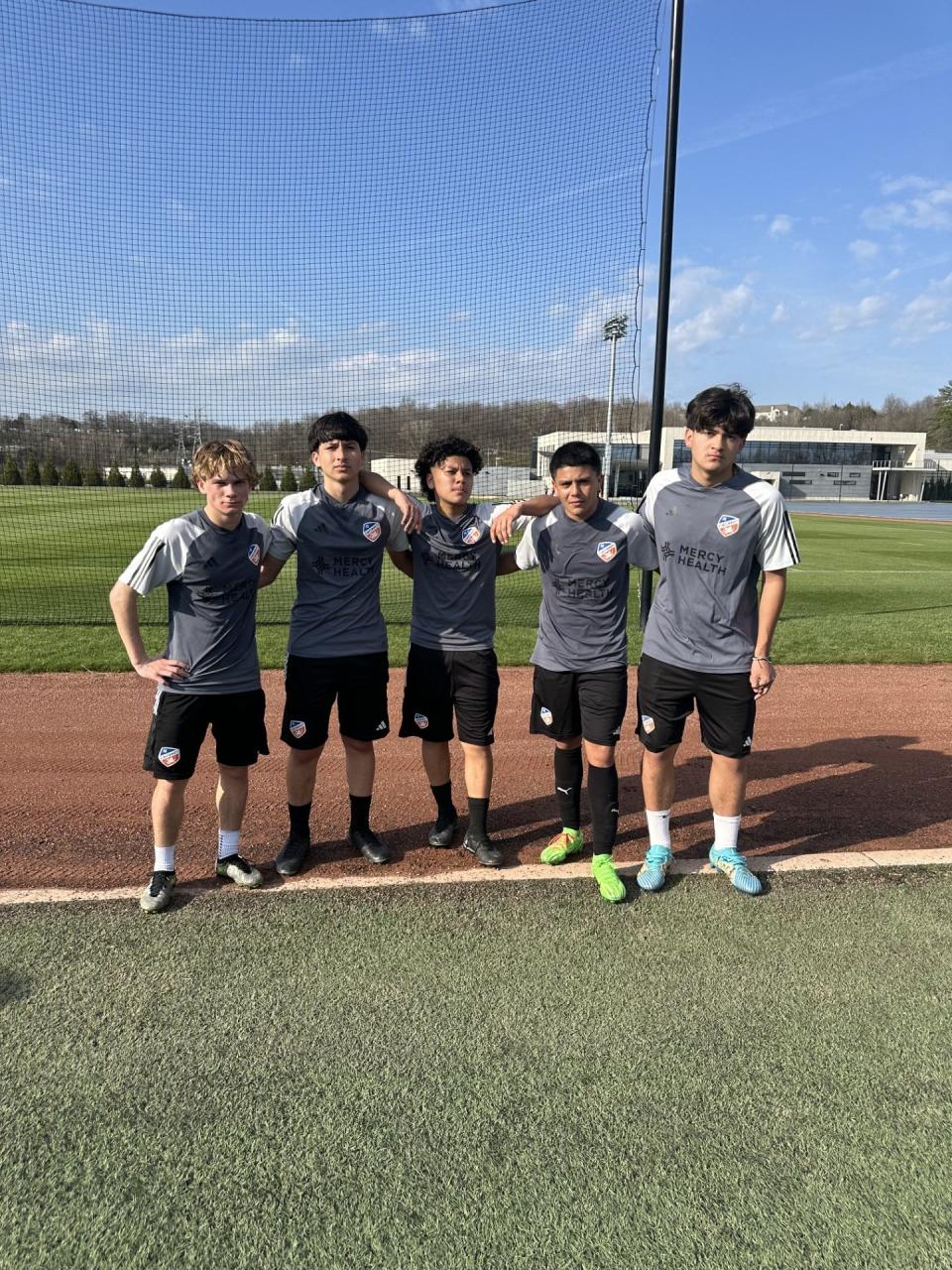 (From left to right) Caleb Cliburn, Daniel Guerra, Angelo Vieyra, Angelnoe Perez and Aaron Chavez pose for picture during their youth soccer trials for F.C. Cincinnati in Cincinnati, Ohio.