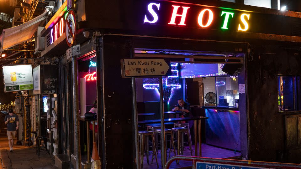 A man sits inside a bar in Lan Kwai Fong, Hong Kong's renowned nightlife hub. - Noemi Cassanelli/CNN