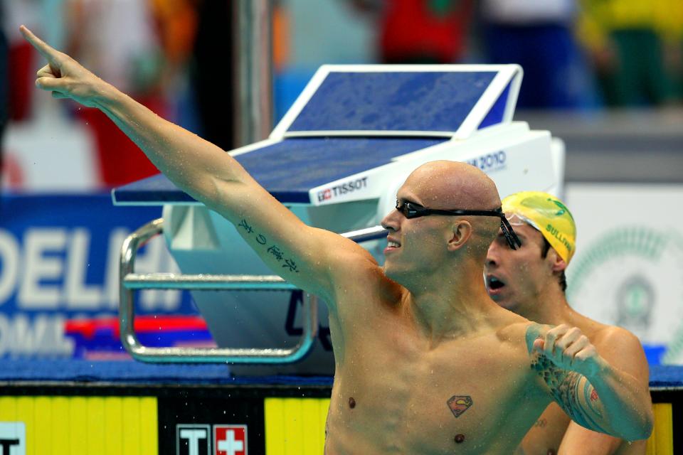 DELHI, INDIA - OCTOBER 07: Brent Hayden of Canada celebrates finishing the Men's 100m Freestyle Final in first place and wins the gold medal at the Dr. S.P. Mukherjee Aquatics Complex during day four of the Delhi 2010 Commonwealth Games on October 7, 2010 in Delhi, India. (Photo by Cameron Spencer/Getty Images)