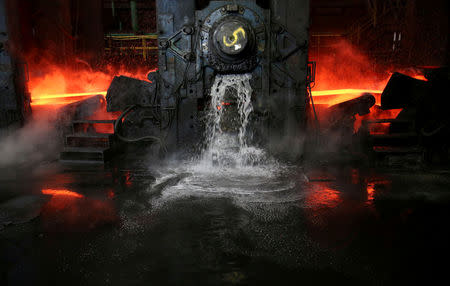 Water flows out as a steel slab is cooled at the Novolipetsk Steel PAO steel mill in Farrell, Pennsylvania, U.S., March 9, 2018. REUTERS/Aaron Josefczyk