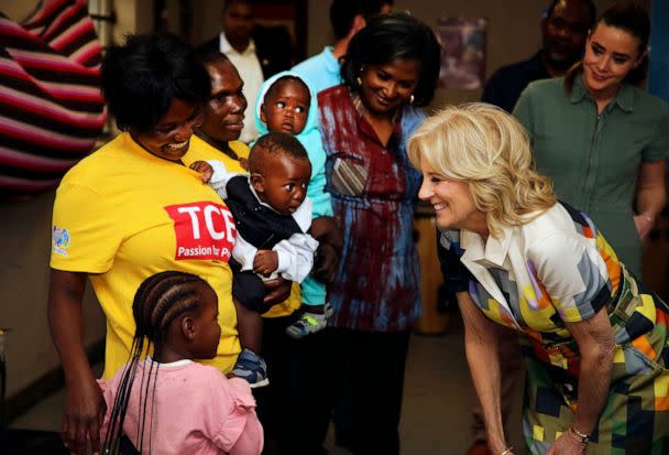 PHOTO: U.S. First Lady Jill Biden, right, reacts during a visit to a U.S. President's Emergency Plan for AIDS Relief (PEPFAR) project at an informal settlement near Windhoek, Namibia, Feb. 23, 2023. (Dirk Heinrich/AP)