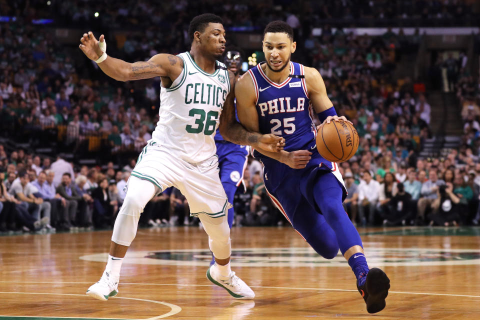 Ben Simmons tries to find some room to work against the Celtics’ Marcus Smart on Thursday night. (Getty Images)