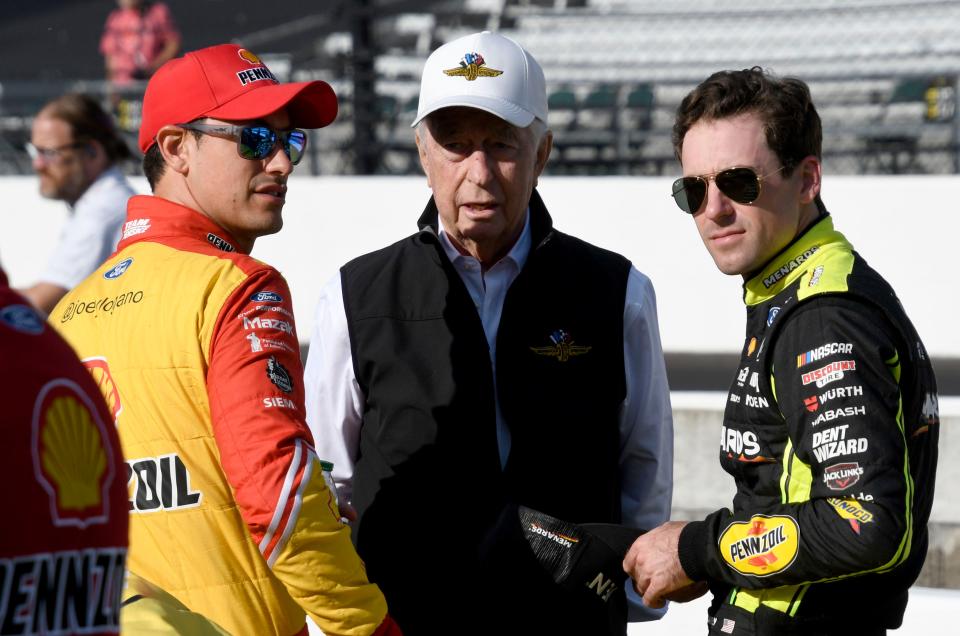 Roger Penske talks with NASCAR Cup Series driver Joey Logano (22) and NASCAR Cup Series driver Ryan Blaney (12) on Saturday, July 30, 2022, during practice for the Verizon 200 at the Brickyard at Indianapolis Motor Speedway.