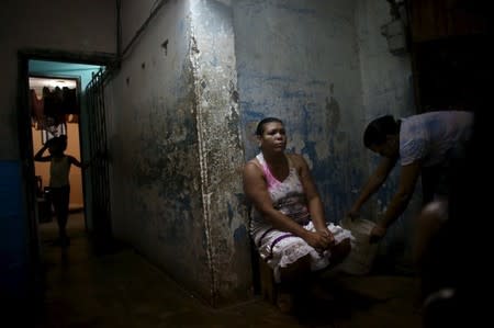 Yolanda Sanchez, 44, sits in her home in Havana, March 19, 2016. REUTERS/Alexandre Meneghini