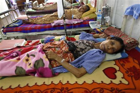 Women lie in a ward as they get treatment in Muslims Charity hospital in Yangon November 1, 2013. REUTERS/Soe Zeya Tun