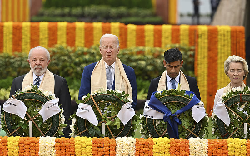 From left, Brazil President <span class="caas-xray-inline-tooltip"><span class="caas-xray-inline caas-xray-entity caas-xray-pill rapid-nonanchor-lt" data-entity-id="Luiz_Inácio_Lula_da_Silva" data-ylk="cid:Luiz_Inácio_Lula_da_Silva;pos:3;elmt:wiki;sec:pill-inline-entity;elm:pill-inline-text;itc:1;cat:OfficeHolder;" tabindex="0" aria-haspopup="dialog"><a href="https://search.yahoo.com/search?p=Luiz%20In%C3%A1cio%20Lula%20da%20Silva" data-i13n="cid:Luiz_Inácio_Lula_da_Silva;pos:3;elmt:wiki;sec:pill-inline-entity;elm:pill-inline-text;itc:1;cat:OfficeHolder;" tabindex="-1" data-ylk="slk:Luiz Inácio Lula da Silva;cid:Luiz_Inácio_Lula_da_Silva;pos:3;elmt:wiki;sec:pill-inline-entity;elm:pill-inline-text;itc:1;cat:OfficeHolder;" class="link ">Luiz Inácio Lula da Silva</a></span></span>, President Biden, U.K. Prime Minister Rishi Sunak and European Commission President <span class="caas-xray-inline-tooltip"><span class="caas-xray-inline caas-xray-entity caas-xray-pill rapid-nonanchor-lt" data-entity-id="Ursula_von_der_Leyen" data-ylk="cid:Ursula_von_der_Leyen;pos:5;elmt:wiki;sec:pill-inline-entity;elm:pill-inline-text;itc:1;cat:OfficeHolder;" tabindex="0" aria-haspopup="dialog"><a href="https://search.yahoo.com/search?p=Ursula%20von%20der%20Leyen" data-i13n="cid:Ursula_von_der_Leyen;pos:5;elmt:wiki;sec:pill-inline-entity;elm:pill-inline-text;itc:1;cat:OfficeHolder;" tabindex="-1" data-ylk="slk:Ursula von der Leyen;cid:Ursula_von_der_Leyen;pos:5;elmt:wiki;sec:pill-inline-entity;elm:pill-inline-text;itc:1;cat:OfficeHolder;" class="link ">Ursula von der Leyen</a></span></span> pay their tributes Sept. 10 at the Rajghat, a Mahatma Gandhi memorial, in New Delhi, India. <em>Kenny Holston Pool via AP</em>