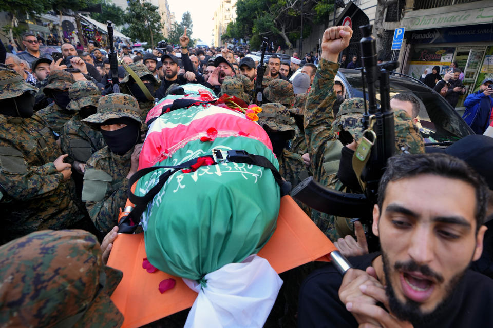 Islamic Group members known as Jamaa Islamiya carry the body of their comrade Mohammad Riad Mohyeldin, who was killed in an apparent Israeli strike, during his funeral procession in Beirut, Lebanon, Tuesday, March 12, 2024. The Secretary-General of al-Jamaa al-Islamiya, or the Islamic Group, Sheikh Mohammed Takkoush allied with Hamas and Hezbollah said Tuesday, March 26, 2024 they are closely coordinating with both groups along the southern border with Israel where they have claimed responsibility for several attacks over the past months. (AP Photo/Bilal Hussein)