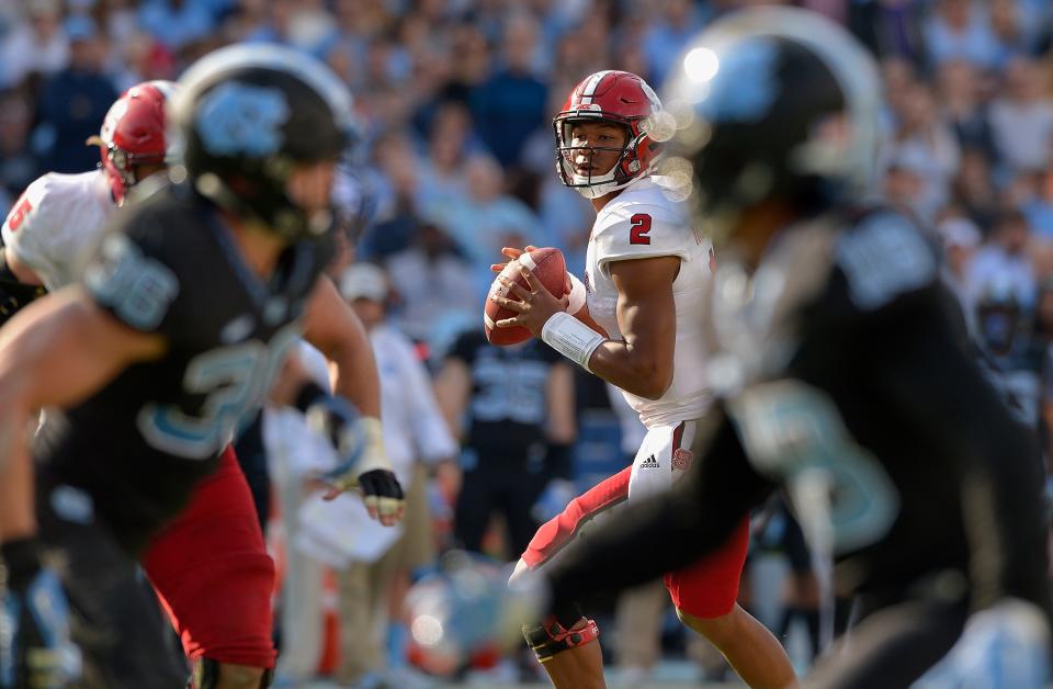 CHAPEL HILL, NC – NOVEMBER 25: Jalan McClendon #2 of the North Carolina State Wolfpack drops back to pass against the North Carolina Tar Heels during their game at Kenan Stadium on November 25, 2016 in Chapel Hill, North Carolina. (Photo by Grant Halverson/Getty Images)