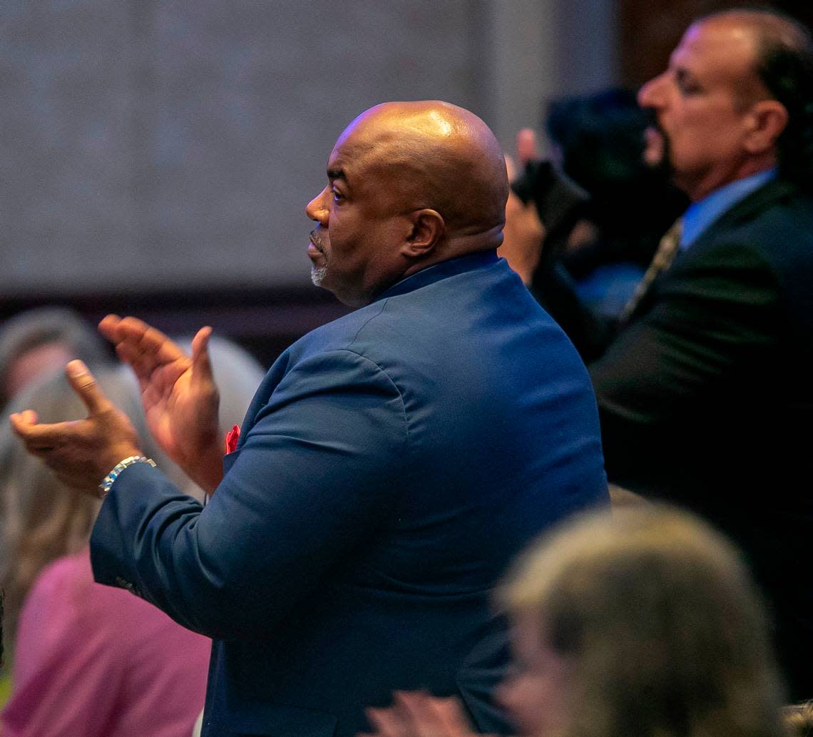 North Carolina Lt. Governor Mark Robinson, a candidate for governor in 2024, stands to applaud former President Donald Trump, during his speech at the North Carolina Republican Party Convention on Saturday, June 10, 2023 in Greensboro, N.C.
