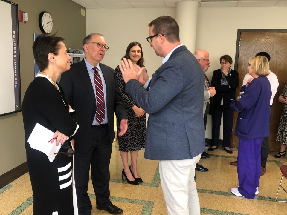 Kathy Connerton, Lourdes president and CEO, and Dr. Edmund Sabanegh Jr., president and CEO of Guthrie, meet with Lourdes employees inside Lourdes Hospital after announcing Guthrie's acquisition of Lourdes Thursday, June 8, 2023.