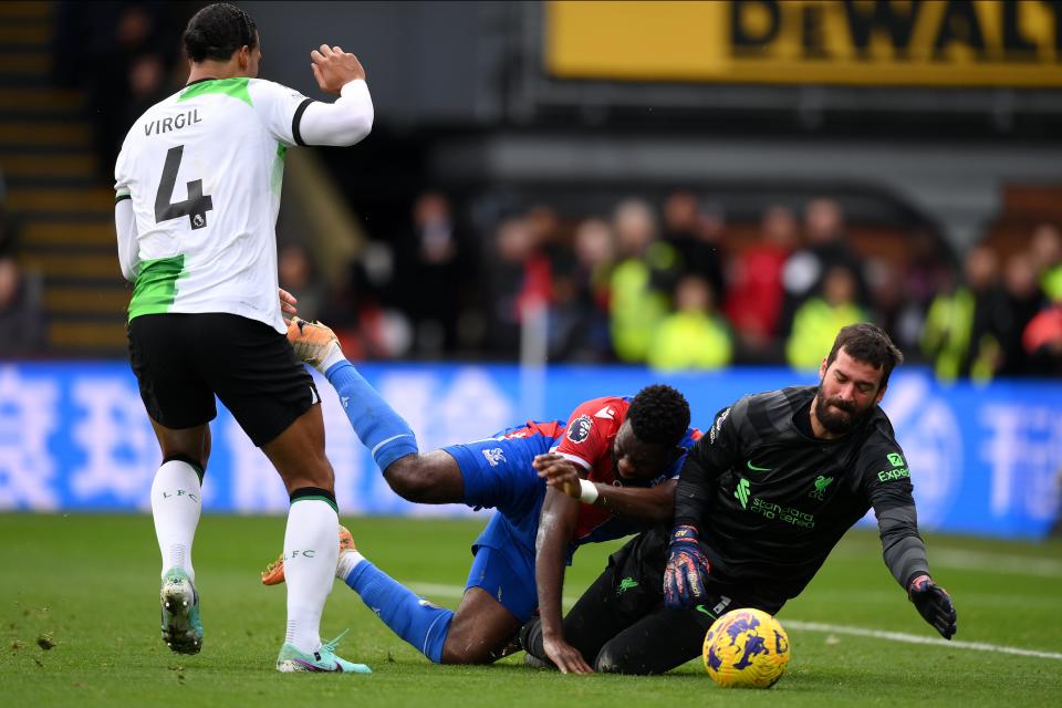 Virgil van Dijk looked to have conceded a penalty, but it was overturned by the VAR (Getty Images)