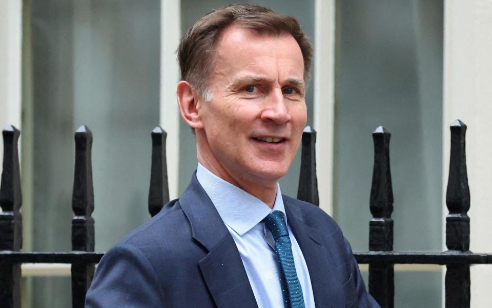 Jeremy Hunt leaves Downing Street