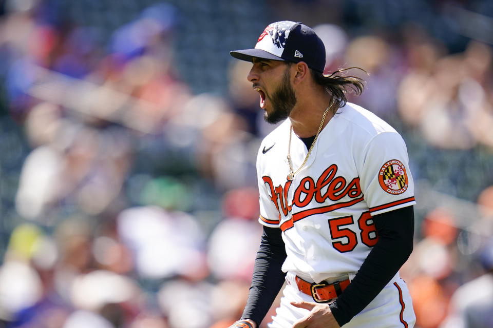 Baltimore Orioles relief pitcher Cionel Perez reacts after pitching to the Texas Rangers during the eighth inning of a baseball game, Monday, July 4, 2022, in Baltimore. The Orioles won 7-6 in ten innings. (AP Photo/Julio Cortez)