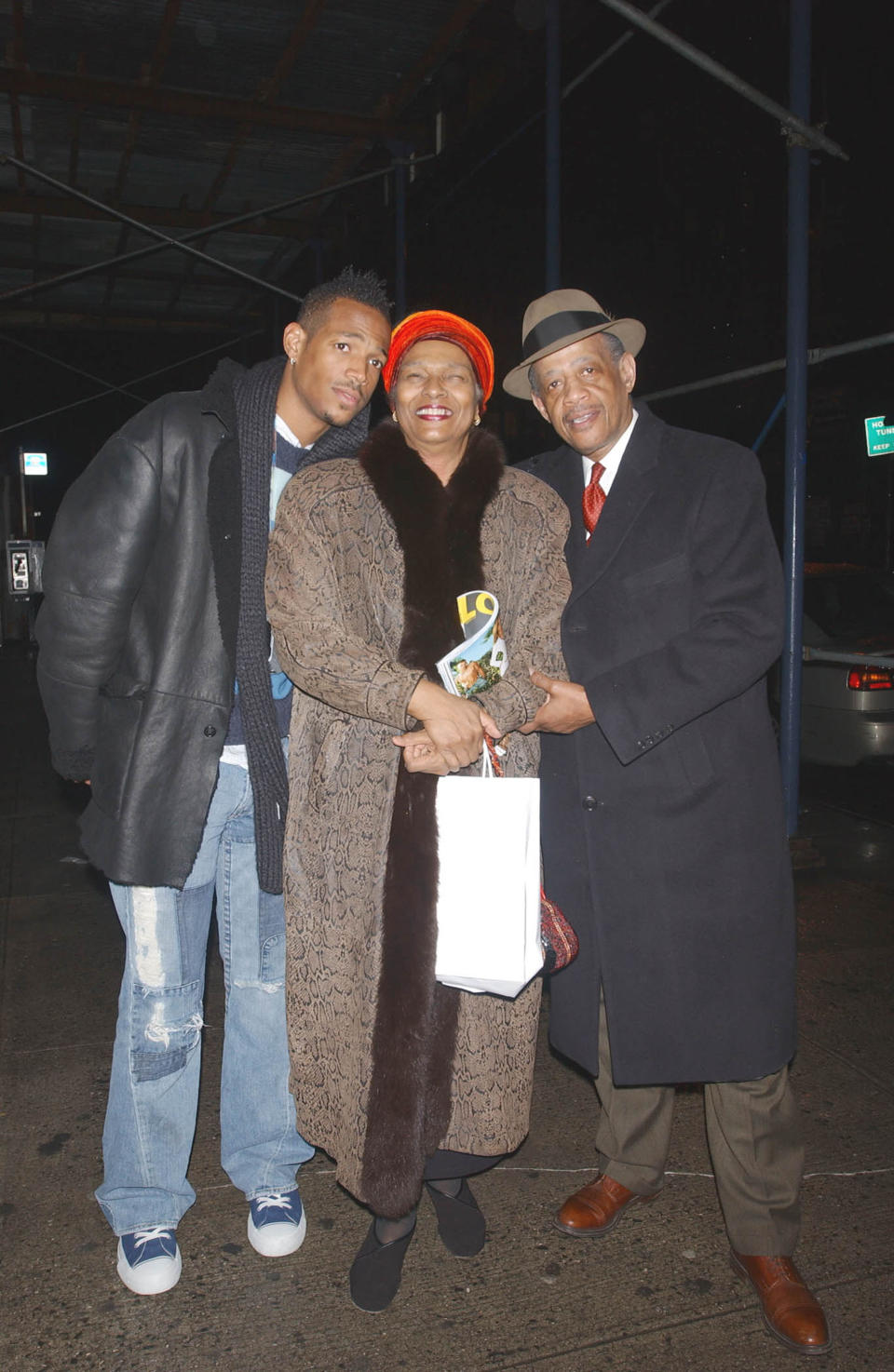 (L-R): Actor/comedian Marlon Wayans, mother, Elvira and his father, Howell, leave a restaurant after dinner February 15, 2005 in New York City. (Photo by Arnaldo Magnani/Getty Images)