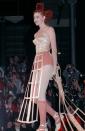 <p>A model wears a silk bustier and crinoline at the Jean Paul Gaultier spring 1989 fashion show. </p>