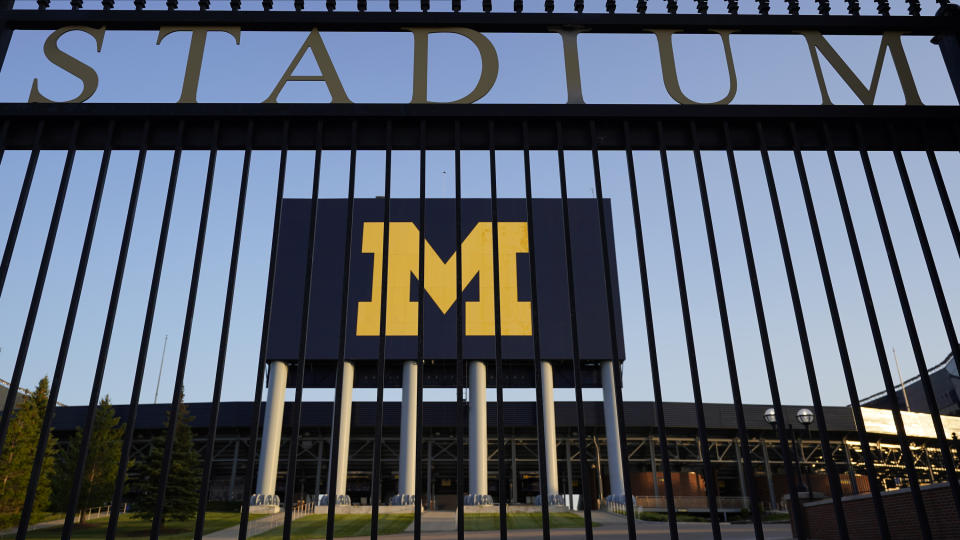 FILE - This Aug. 13, 2020 file photo shows the University of Michigan football stadium in Ann Arbor, Mich. A report says staff at the University of Michigan missed many opportunities to stop the late Dr. Robert Anderson, who committed sexual misconduct against hundreds of patients over decades at the school. (AP Photo/Paul Sancya, File)