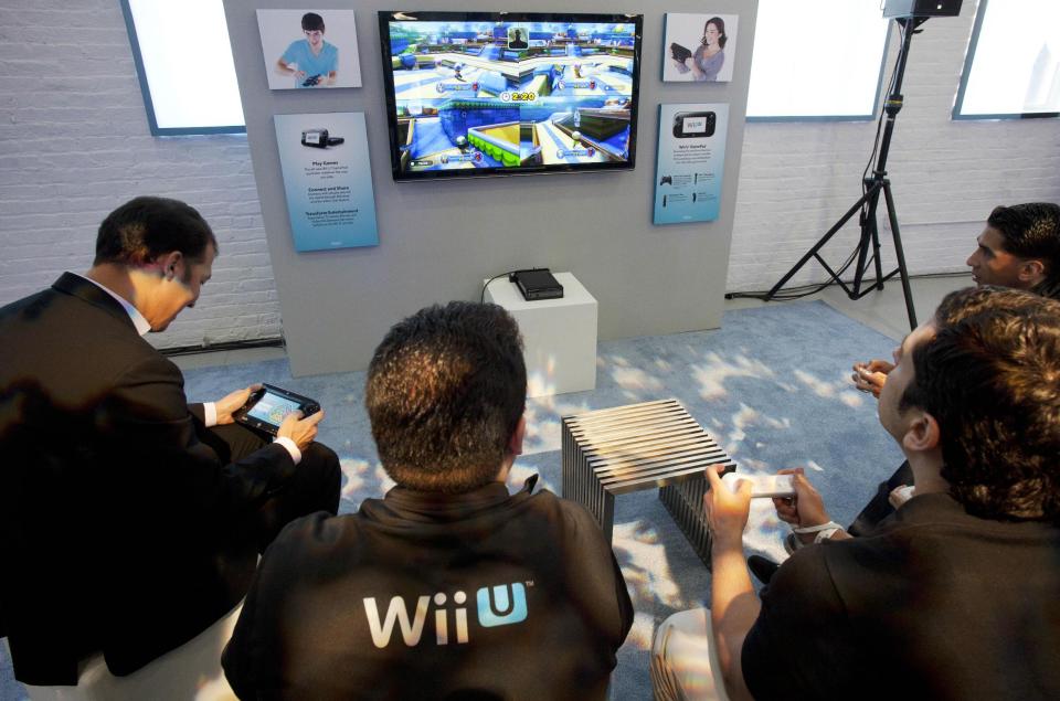 Nintendo's Wii U GamePad and console are unveiled, Thursday, Sept. 13, 2012 in New York. The gaming console will start at $300 and go on sale in the U.S. on Nov. 18, in time for the holidays, the company said Thursday. (AP Photo/Mark Lennihan)