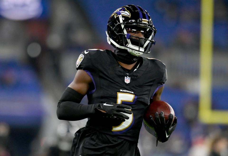 Nov 16, 2023; Baltimore, Maryland, USA; Baltimore Ravens cornerback Jalyn Armour-Davis (5) warms up before a game against the Cincinnati Bengals at M&T Bank Stadium. Mandatory Credit: Tommy Gilligan-USA TODAY Sports