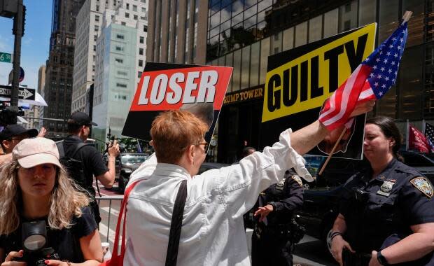 Supporters of President Joe Biden and Trump demonstrate outside Trump Tower, on May 31 in New York City. 