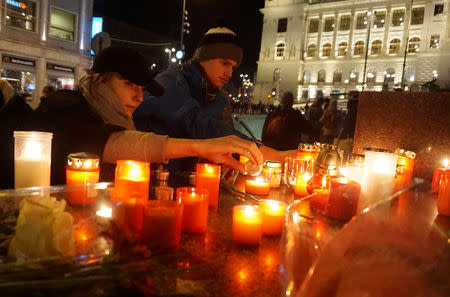 People light candles to commemorate Jan Palach at Wenceslas Square in Prague, Czech Republic, January 16, 2019. REUTERS/Jiri Skacel