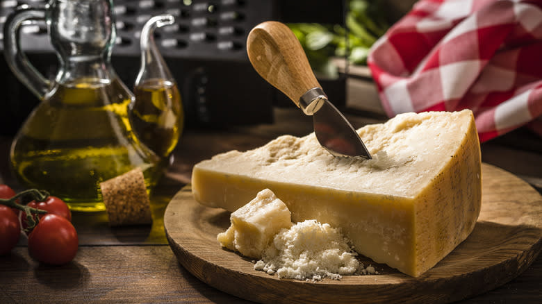 parmesan cheese on wooden board