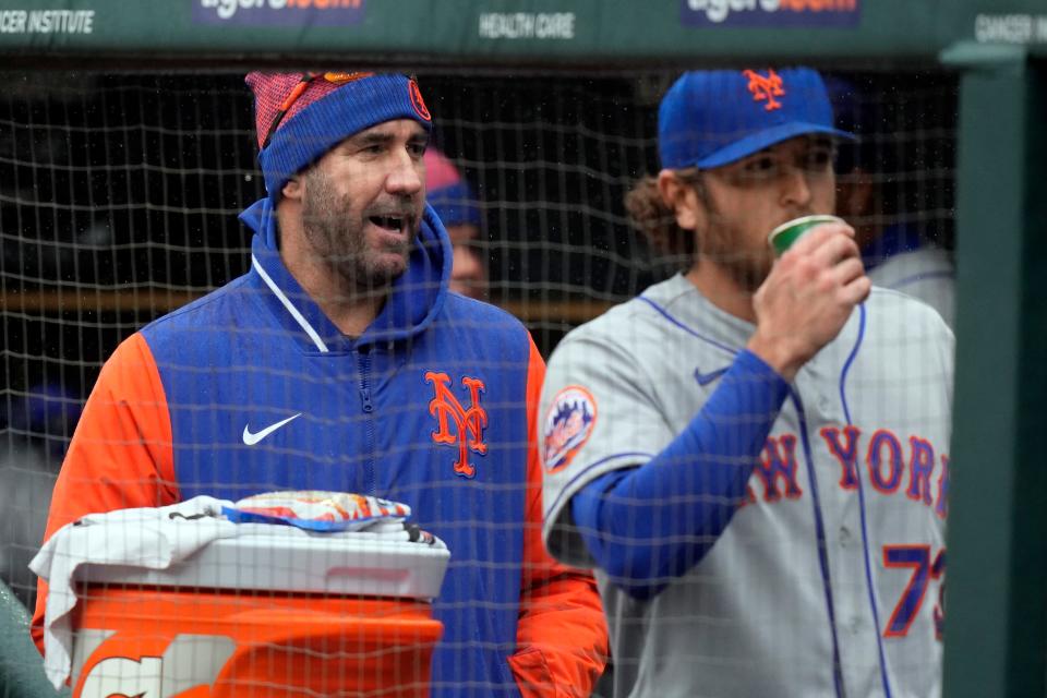 New York Mets starting pitcher Justin Verlander talks to relief pitcher Jimmy Yacabonis (73) in the dugout during the seventh inning in the first game of a doubleheader against the Detroit Tigers at Comerica Park in Detroit on Wednesday, May 3, 2023.