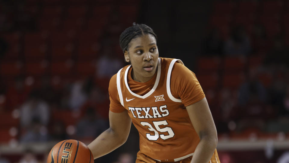 Texas forward Madison Booker (35) during the first half of an NCAA college basketball game against Oklahoma Wednesday, Feb. 28, 2024, in Norman, Okla. (AP Photo/Garett Fisbeck)