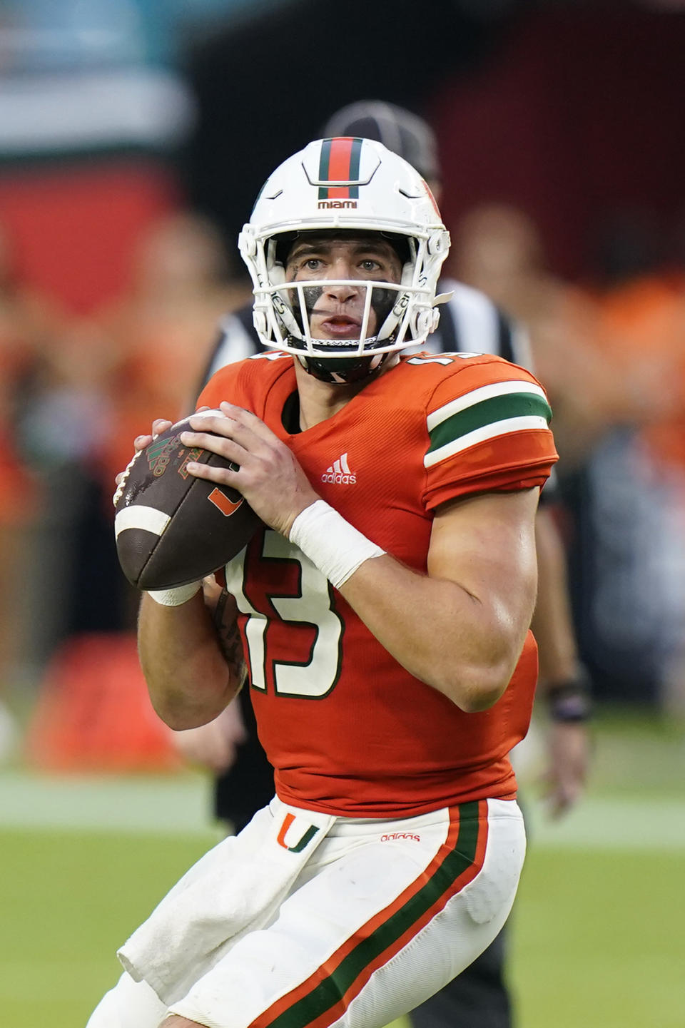 Miami quarterback Jake Garcia (13) drops back to pass during the second half of an NCAA college football game against Middle Tennessee, Saturday, Sept. 24, 2022, in Miami Gardens, Fla. (AP Photo/Wilfredo Lee)