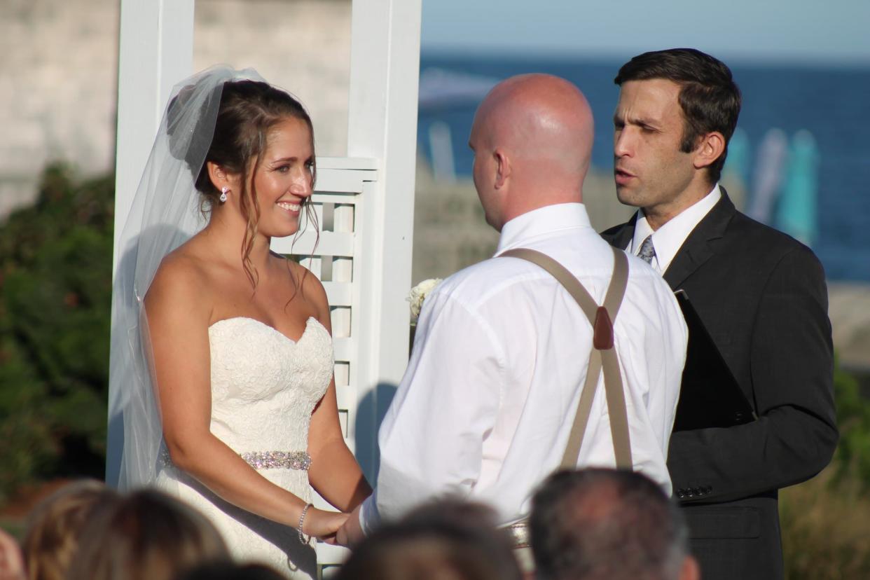 A man allegedly posed as an officiant at this couple’s wedding, before stealing guests’ credit cards. (Photo Courtesy of Ashley Veilleux)