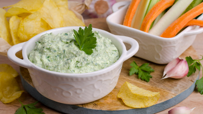 bowl of cheese with potato chips