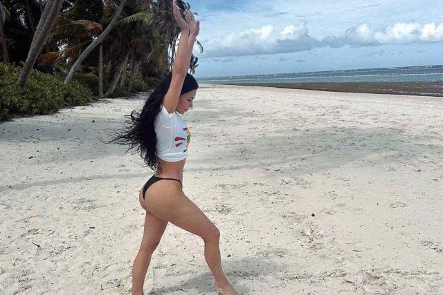 Kim Kardashian Demonstrates Her Gymnastics Skills Doing Cartwheels in Her Thong  Bikini