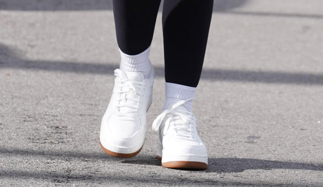 Lucy Hale Laces into Alo's All-White Sneakers While Off-Duty