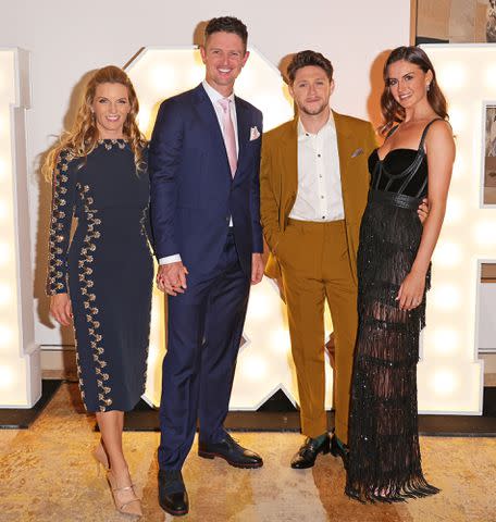 David M. Benett/Dave Benett/Getty Kate Rose, Justin Rose, Niall Horan and Mia Woolley attend the Horan & Rose Show: Modest! Golf co-founder Niall Horan and Justin Rose brought the world of music and sport together at The Grove, presenting an evening of entertainment to raise money for The Black Heart Foundation on September 03, 2021 in Watford, England.