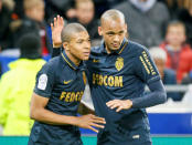 Football Soccer - Olympique Lyon v Monaco - French Ligue 1 - Stade de Lyon – Decines, France - 23/4/2017 Monaco's Kylian Mbappe (L) reacts after scoring. REUTERS/Robert Pratta