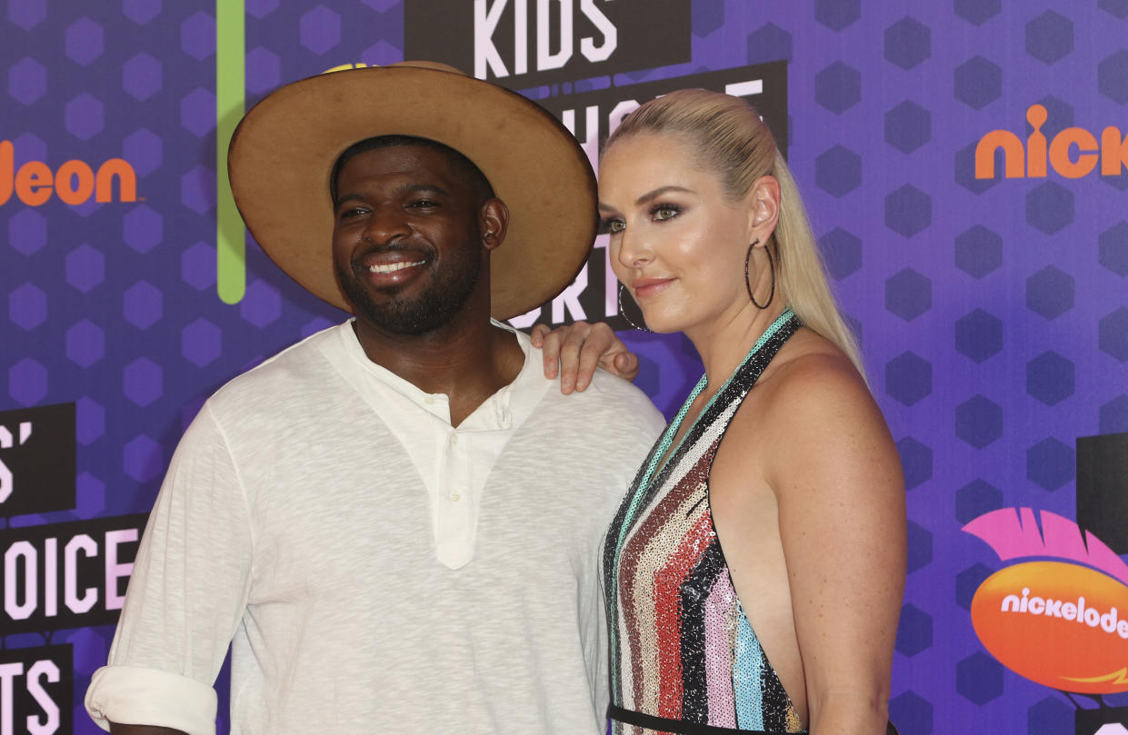 NHL hockey player P. K. Subban, of the Nashville Predators, left, and skier Lindsey Vonn arrive at the Kids' Choice Sports Awards at the Barker Hangar on Thursday, July 19, 2018, in Santa Monica, Calif. (Photo by Willy Sanjuan/Invision/AP)