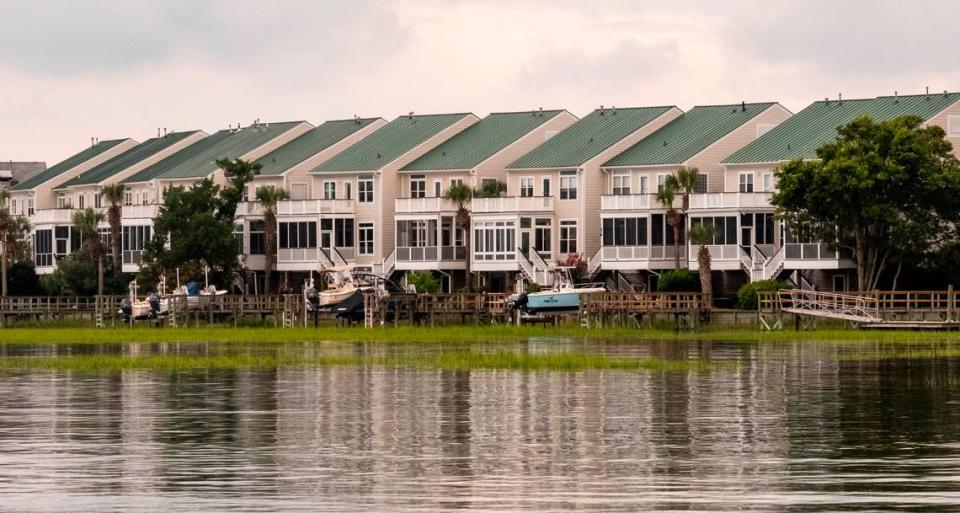 High Tide comes close to condominiums built along the Folly River. Aug. 11, 2021.