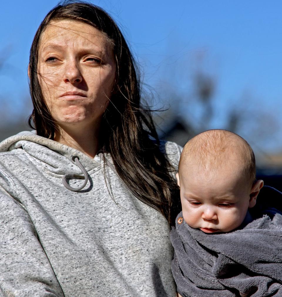 Brianne Madson visits the home of 4-year-old Athena Brownfield with her son Nathan in Cyril, Okla. on Wednesday, Jan. 19, 2023.