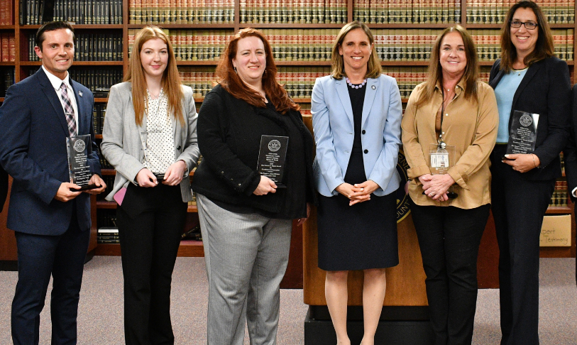 Some of the Westchester District Attorney's Office 2023 award winners pose with DA Mimi Rocah (third from right) on May 14, 2024. From left: Thomas Woodburn and Chloe McSwiney, recipients of the Stuart Cohen Award for Investigative Excellence; and Laura Forbes, Stacey Nolan-Meaney and Christine Hatfield, recipients of the Patrick P. Moore Award for Excellence in Prosecution.
